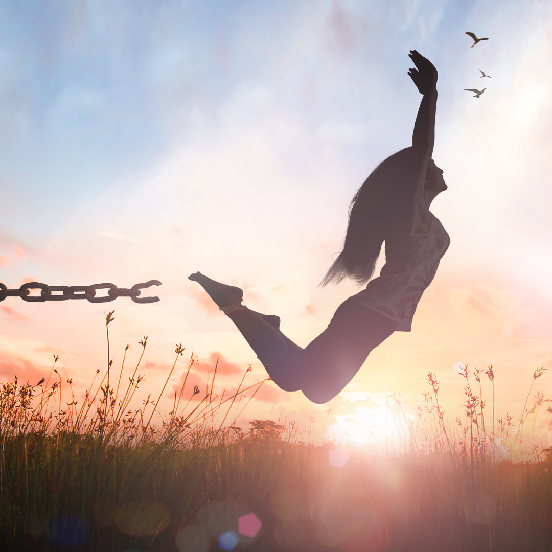 Woman breaking free of chain